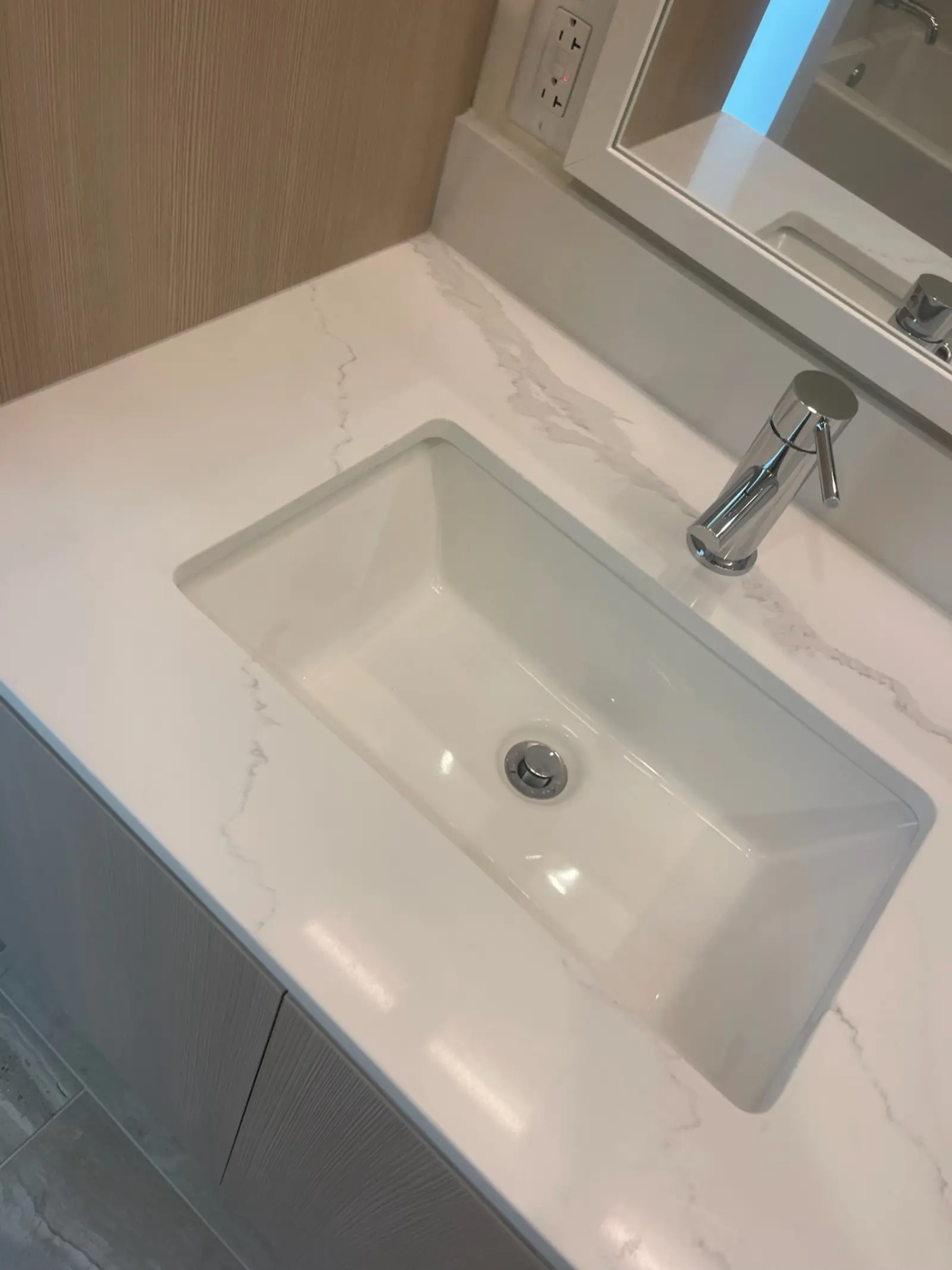 Post-construction vanity cleaning San Antonio TX - marble countertop and sink detail for new apartments