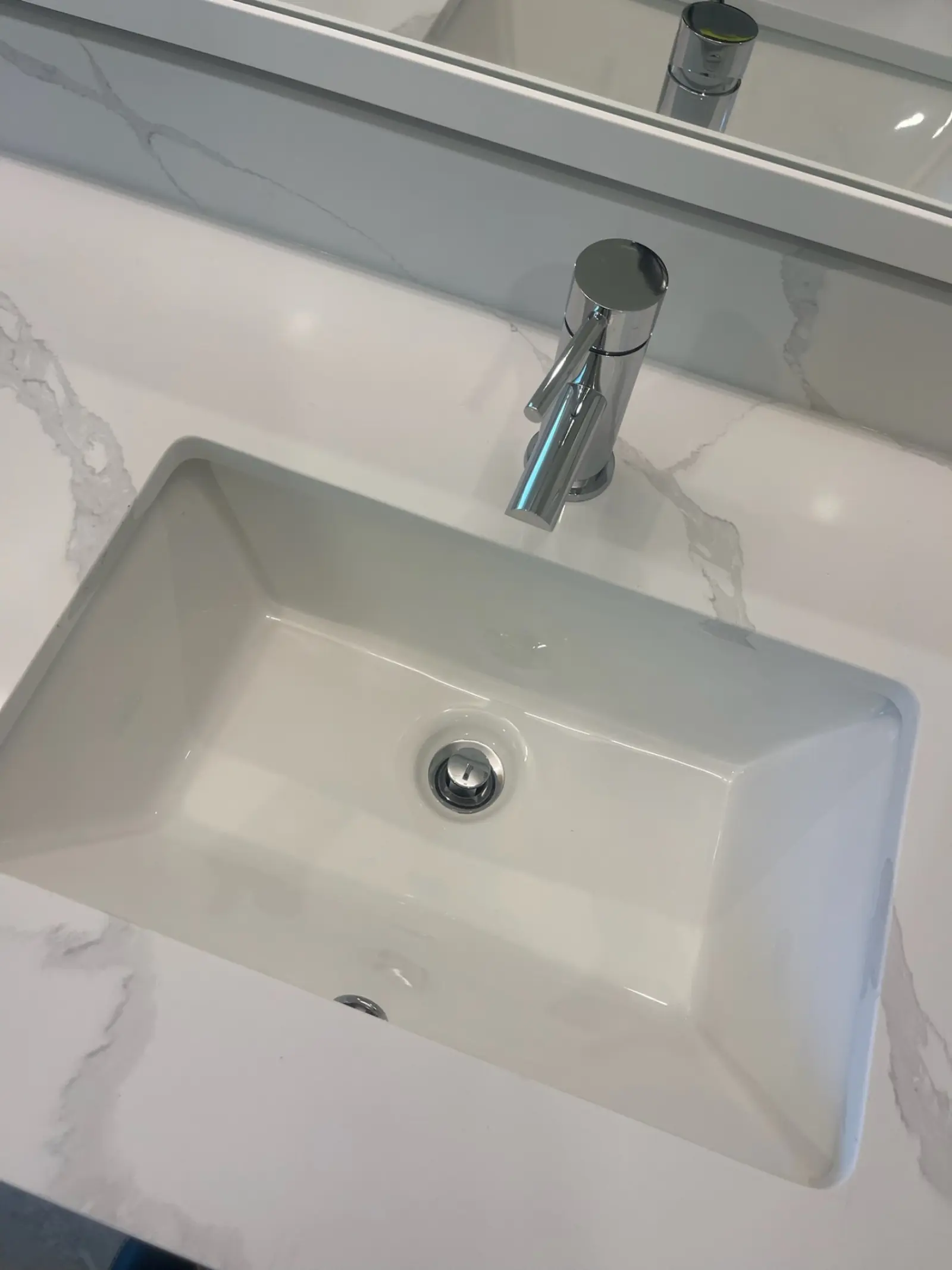 Apartment turnover cleaning San Antonio - luxury bathroom sink and marble counter polishing
