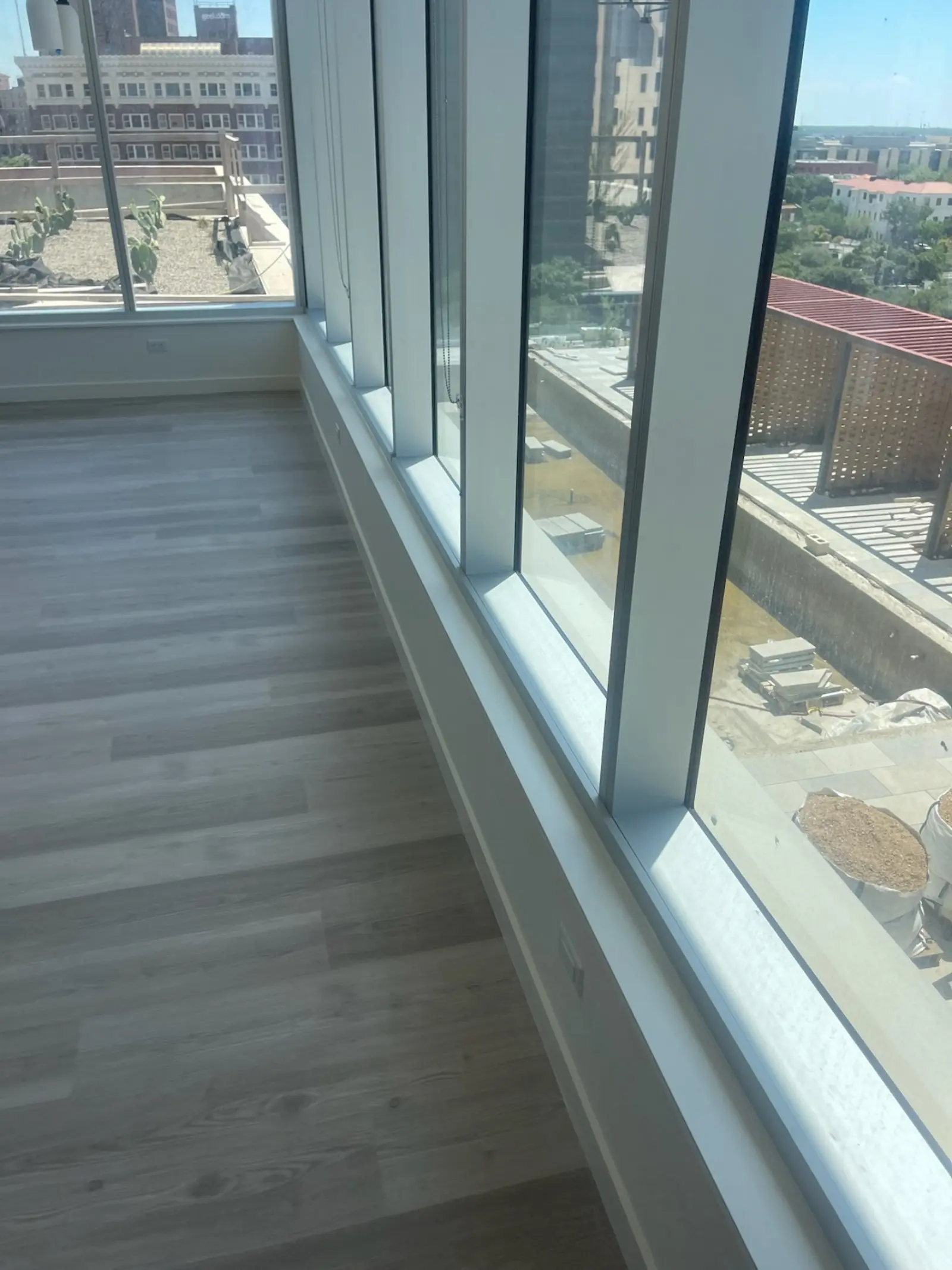 Post-construction window cleaning San Antonio - high-rise apartment floor-to-ceiling window detail